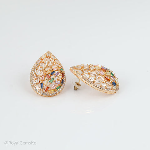 A pair of gold teardrop-shaped stud earrings decorated with clear marquise-cut crystals and small multicolored enamel accents, displayed on a clean white background.